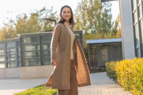 Portrait of asian businesswoman walking in street